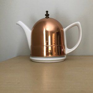White CeramicTeapot with Copper Cozy